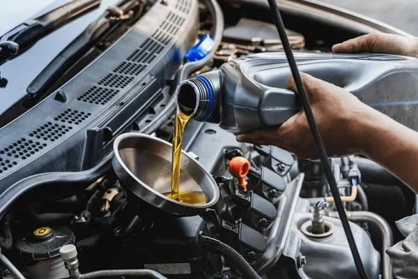 What Is the Thing You Slide Under a Car On When Changing Oil